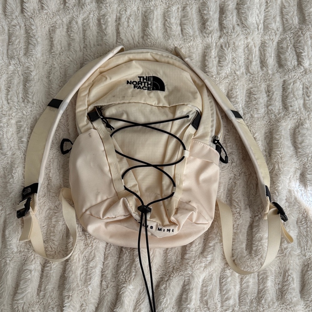 The North Face Mini Backpack in Light Beige
